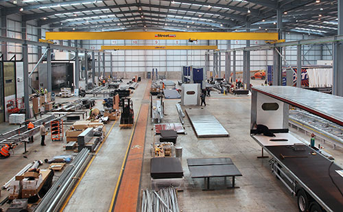 0-5331st1h-tiger-trailers-street-crane-500px.jpg Having two cranes in each bay gives us greater manufacturing flexibility and ensures that our fitters are not standing around waiting for material or for a fabrication to be moved on to the next production stage.