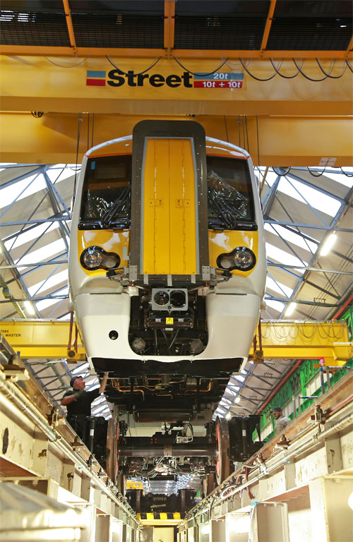 0-overhead2.jpg Special on-crane safety equipment includes audible alarms as the cranes move up the workshop.